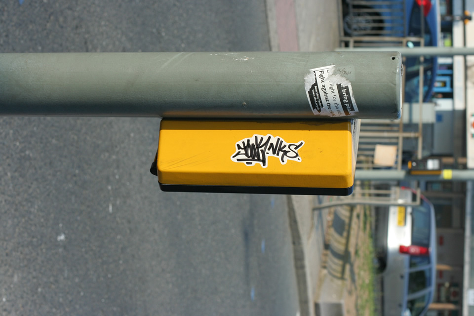 Sticker on pedestrian crossing control