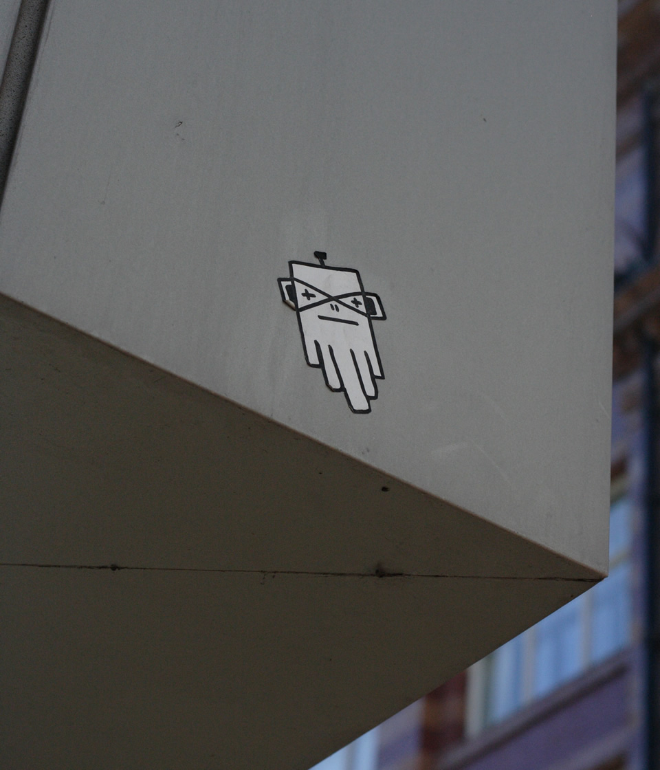 Blank and white sticker on a metal wall
