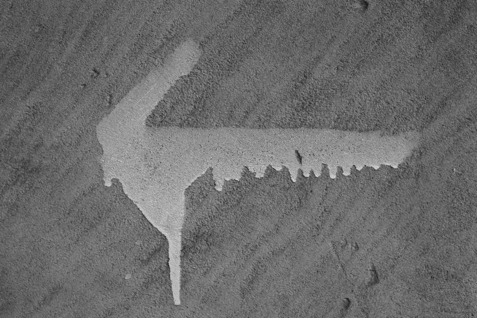 45 degree arrow with paint drips