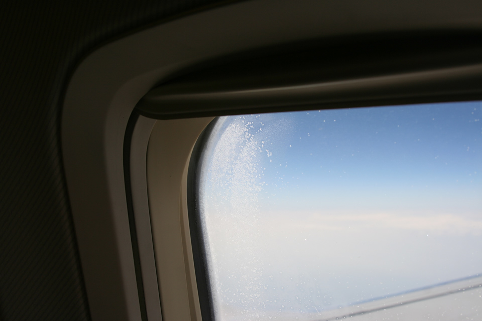 Frosted window on an airplane
