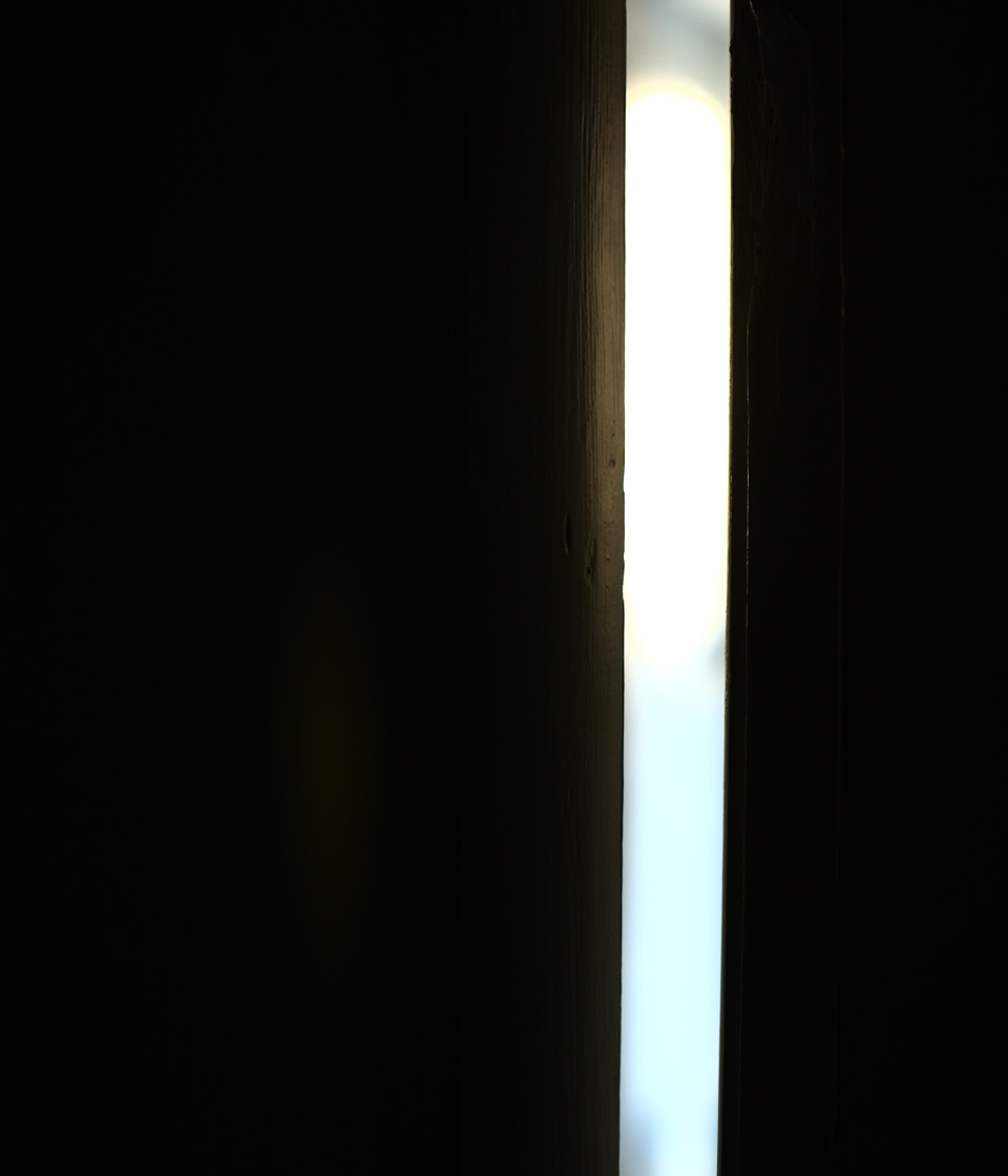 Light through narrow door opening