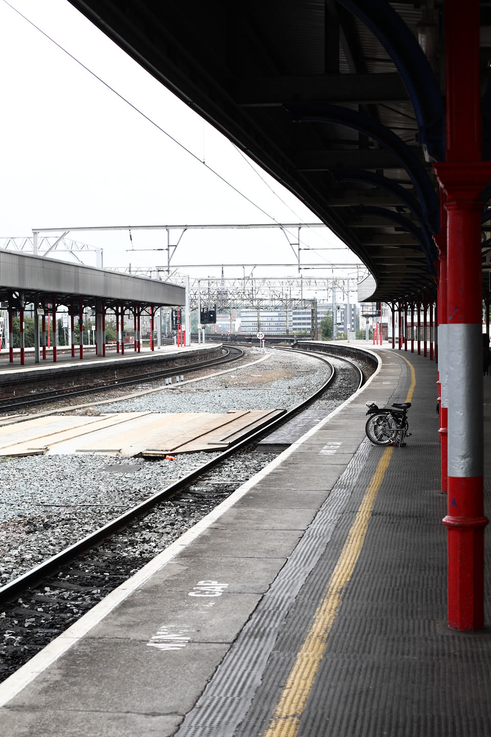Folding bicycle on railway platform