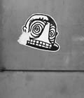 Torn sticker of a face