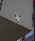Blank and white sticker on a metal wall