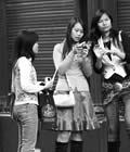 Tourists reviewing digital photos, Edinburgh